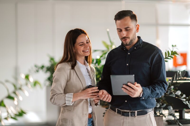 Portrait,Of,Professional,Confident,Businesspeople,Standing,At,Enterprise,Office,With